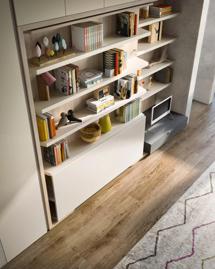 LGM transforming furniture — shelving with the desk folded away
